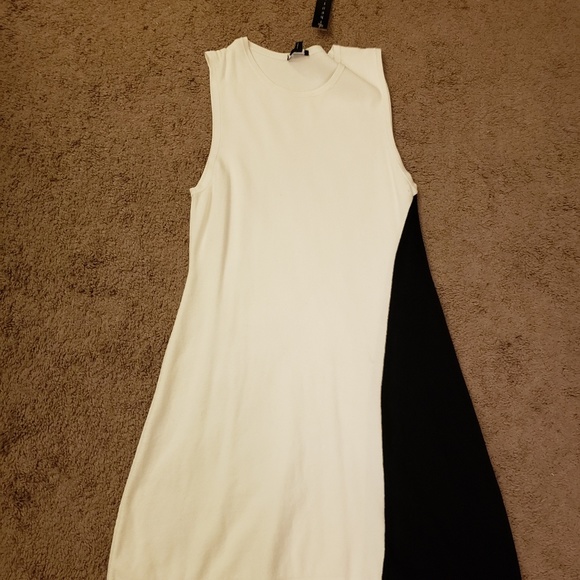 white sleeveless swing dress